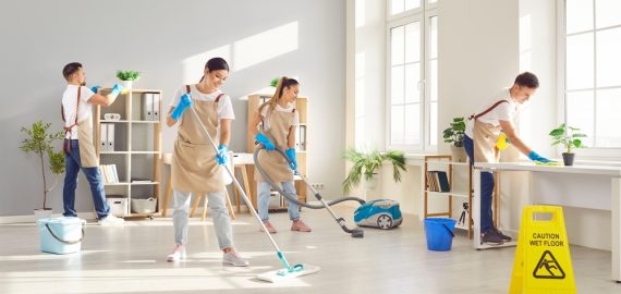 Happy,Smiling,Young,Cleaners,Men,And,Women,In,Uniform,Wiping Happy,Smiling,Young,Cleaners,Men,And,Women,In,Uniform,Wiping